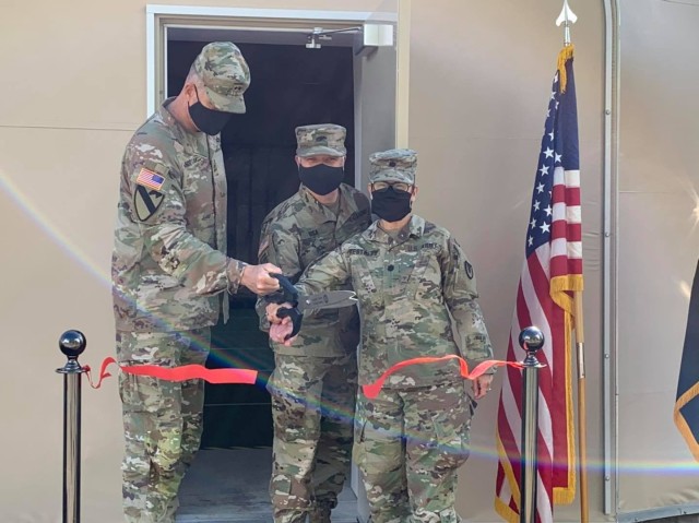 The USARAK Commander Maj. Gen. Peter Andrysiak (left) joined Fort Wainwright Garrison Commander Col. Christopher Ruga (middle) and the 402nd Army Field Support Battalion-Alaska Commander Lt. Col. L. Pily Restrepo for the ceremonial ribbon cutting...
