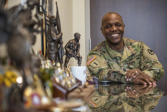 Command Sgt. Maj. Sean J. Rice, U.S. Army Security Assistance Command's new Command Sergeant Major, poses with memorabilia from more than 32 years of service to our Army and nation.   (Photo by Richard Bumgardner, USASAC Public Affairs)