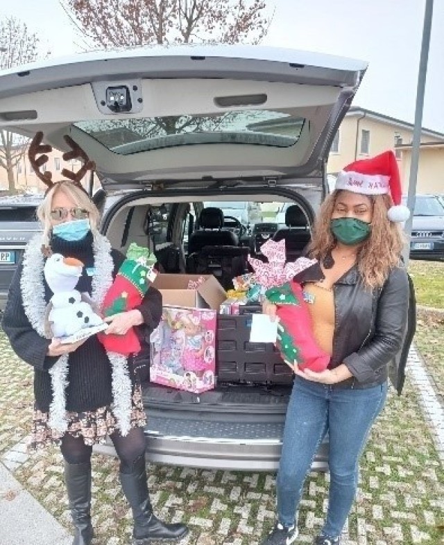 Army Community Service staff deliver donated stockings filled with holiday cheer to quarantined Families in Villaggio Army Family Housing on December 23, 2020. Their efforts were in conjunction with the Commander’s Readiness and Resiliency...