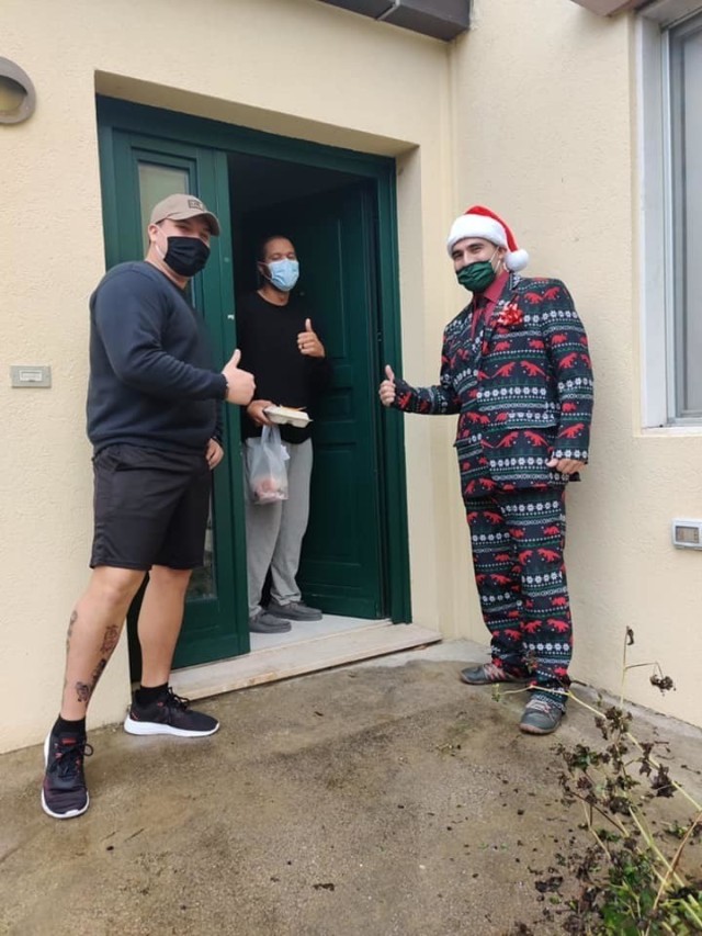 Two Better Opportunities for Single Soldiers members spread cheer and deliver a holiday meal to a resident in Villaggio Army Family Housing on December 25, 2020. Their efforts were in conjunction with the Commander’s Readiness and Resiliency...