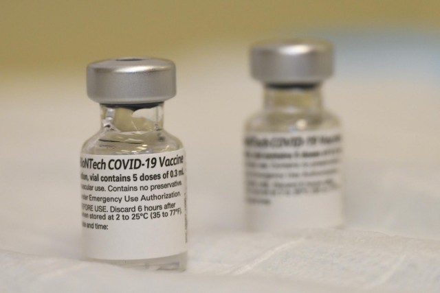 Vials of the Pfizer-BioNTech COVID-19 vaccine are at Walter Reed National Military Medical Center in Bethesda, Md., Dec. 14, 2020, following the vaccine&#39;s emergency use authorization by the Food and Drug Administration.