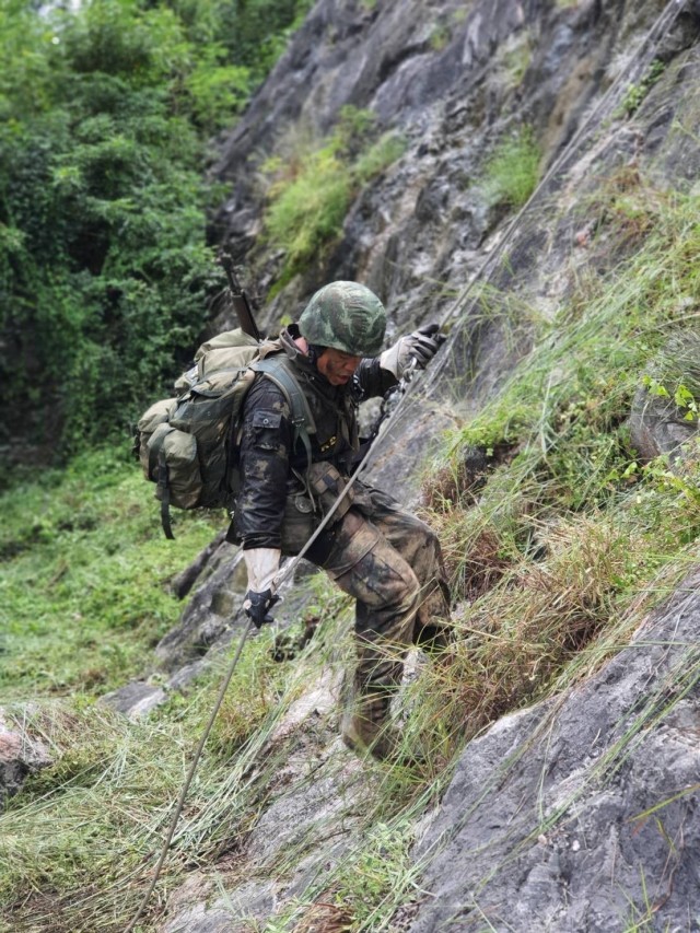 A Green Beret assigned to 1st Special Forces Group (Airborne) rappels down a mountainside October 2020, in the Kingdom of Thailand. He attended the Royal Thai Army’s Ranger School Oct. 17 to Dec. 29 and earned his Ranger Badge, becoming the first U.S. service member to attend and graduate the course in more than 40 years. 