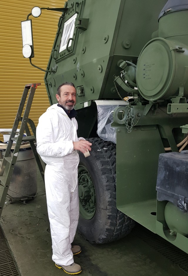 Leonardo Maccioni, from the 405th Army Field Support Brigade’s Army Field Support Battalion – Africa was one of three Italian local national employees with AFSBn-Africa who re-painted 36 vehicles in 50 days, about half the time expected to complete the mission.