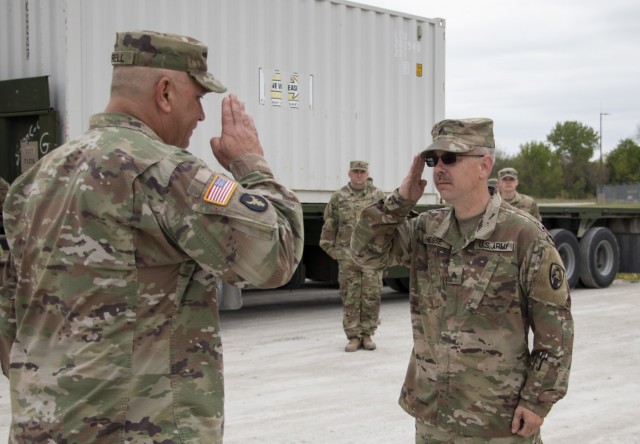 Sgt. Timothy Hesse Sr. salutes Maj. Gen. Ben Corell, Adjutant General of the Iowa National Guard, during a ceremony to award Hesse the Iowa Medal of Merit at Camp Dodge Joint Maneuver Training Center on May 13, 2020. On Aug. 15, 2019, Hesse, a...