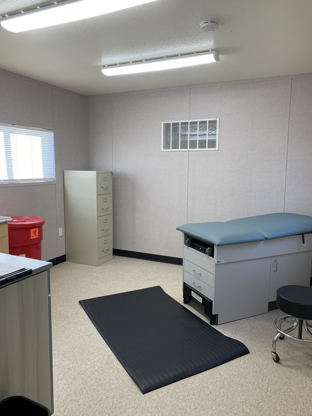 This view of the interior of a trailer at a vaccine trial location in Lake Charles, Louisiana, shows an examination room.  (Photo by Sgt. 1st Class Joseph Love, LOGCAP Support Brigade)