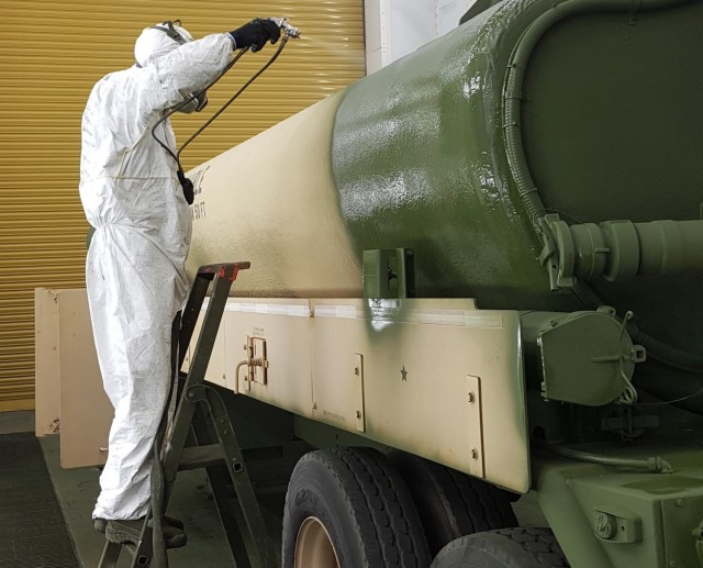 Alessio Maenza, an Italian local national employee from the 405th Army Field Support Brigade’s Army Field Support Battalion – Africa re-paints an Army fuel tanker at Leghorn Army Depot’s paint shop in Livorna, Italy. The fuel tanker was one of 36 vehicles AFSBn-Africa’s Directorate of Maintenance re-painted in just under 50 days, an astounding average production of about five vehicles a week.