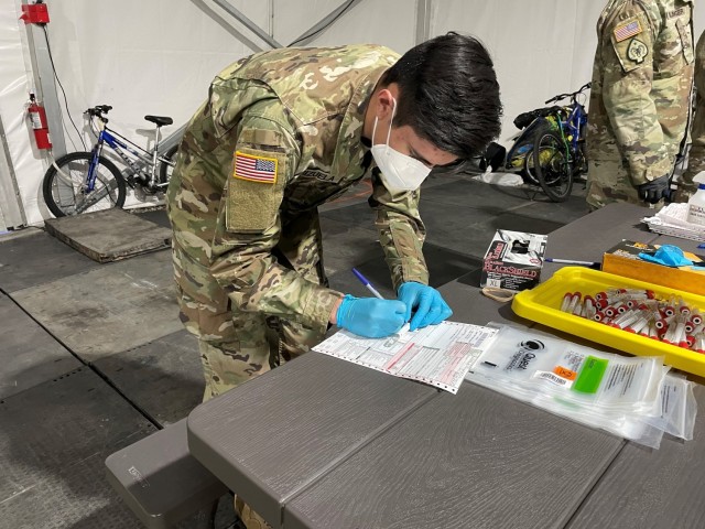 Nevada National Guardsmen conducted a sample collection site for COVID-19 testing in downtown Reno Thursday after the Washoe County Health District noticed an uptick in cases among the city’s homeless citizens in shelters along Fourth Street.