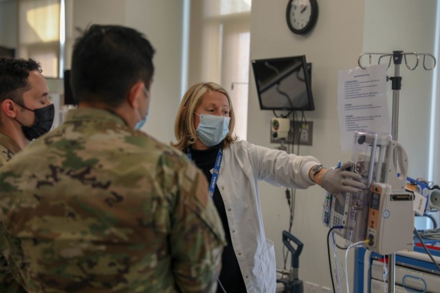 A U.S. Air Force medical provider assigned to Travis Air Force Base, Calif., trains on an Alaris Pump Module for his deployment at the Riverside University Healthcare System on Jan. 7, 2021, in Riverside, California. U.S. Northern Command, through...