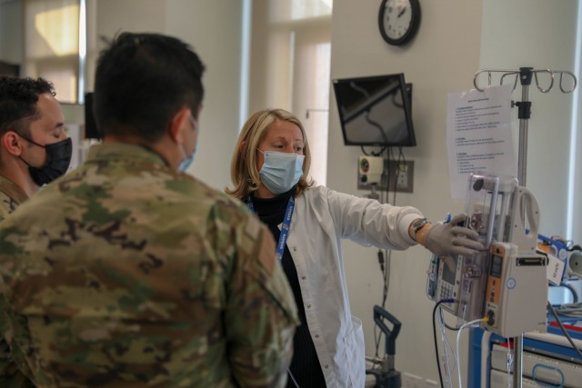 A U.S. Air Force medical provider assigned to Travis Air Force Base, Calif., trains on an Alaris Pump Module for his deployment at the Riverside University Healthcare System on Jan. 7, 2021, in Riverside, California. U.S. Northern Command, through U.S. Army North, remains committed to providing flexible U.S Department of Defense support to the whole-of-America COVID-19 response. (U.S. Army Photo by Spc. Preston Robinson)