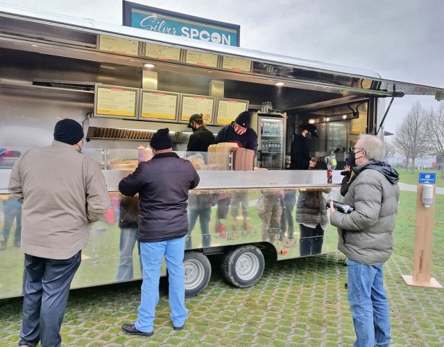 Patrons wait to sample the signature burgers at the new Silver Spoon&#39;s Burger Bliss on Clay Kaserne Jan. 7, 2021.