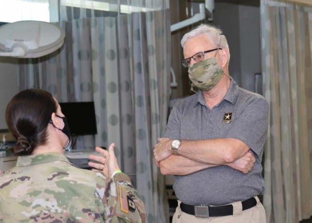 Col. Nancy Parson, left, commander of Weed Army Community Hospital, talks about the hospital’s services with Undersecretary of the Army James E. McPherson Sept. 20, 2020, at Fort Irwin, Calif.