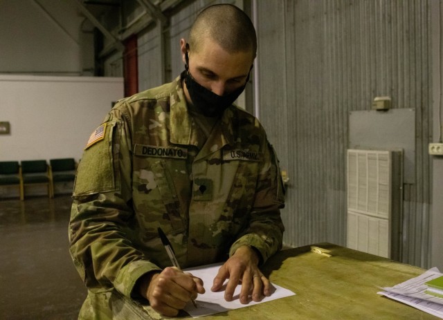 Spc. Matt Dedonato, an avionics mechanic with 3rd Battalion, 238th General Support Aviation Battalion, Delaware Army National Guard, maps out a recovery location during unit recovery team training at Camp Bondsteel in Kosovo on Jan. 6, 2021. Unit...