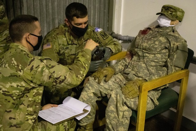 Sgt. James Clark, a signal support systems specialist with the 3rd Battalion, 238th General Support Aviation Battalion, Delaware Army National Guard, and Cpl. Tobias Driscoll, an information technology specialist with the 2nd Infantry Brigade...