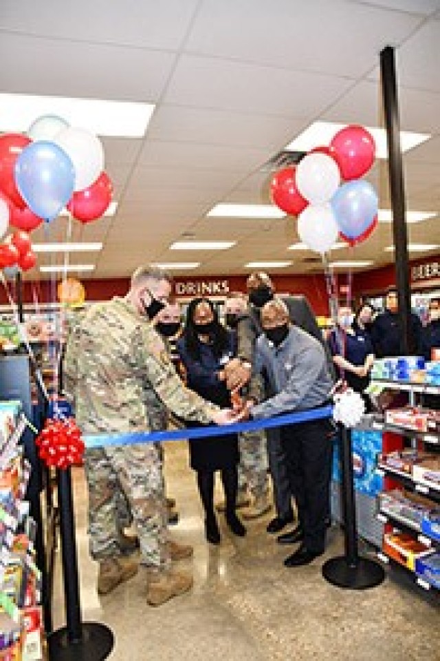 Cutting the ribbon at the Express 3 reopening Jan. 6 are, from left to right, Brig. Gen. David S. Doyle, Joint Readiness Training Center and Fort Polk commanding general, Command Sgt. Maj. Michael C. Henry, post command sergeant major, Ruth...
