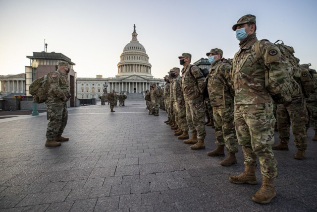 New Jersey National Guard Soldiers and Airmen arrive near the U.S. Capitol to set up security positions in Washington, D.C., Jan. 12, 2021. Guardsmen from several states have traveled to Washington to provide support to federal and district authorities leading up to the 59th presidential Inauguration.