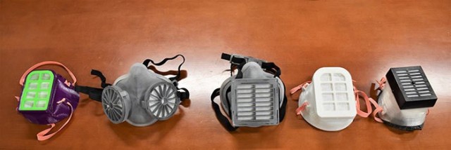 The U.S. Army Medical Materiel Development Activity's Warfighter Expeditionary Medicine and Treatment Project Management Office is involved in the DOD's effort to produce N95 respirators. Shown here are various prototypes of N95 masks that have been considered for production. These particular examples are elastomeric half-mask respirators, which have a reusable frame produced by a 3D printer, with a disposable media or cartridge that filters at the 95-percent level. The three masks on the right are early prototypes, while the two on the left are currently in the test and evaluation phase of development (Photo by Jeffrey Soares, USAMMDA public affairs)