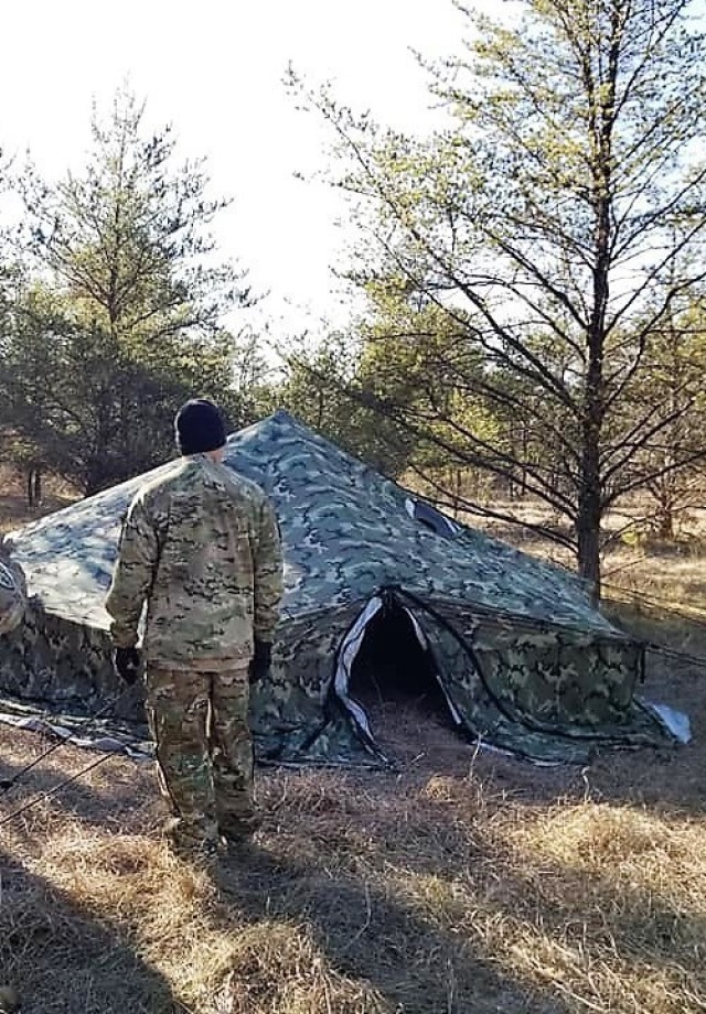 Soldiers with the 1st Battalion, 310th Brigade Engineer Battalion participate in training Dec. 9, 2020, at Fort McCoy, Wis. The training was foundational day training for the unit to focus on multiple subjects including cold-weather operations....