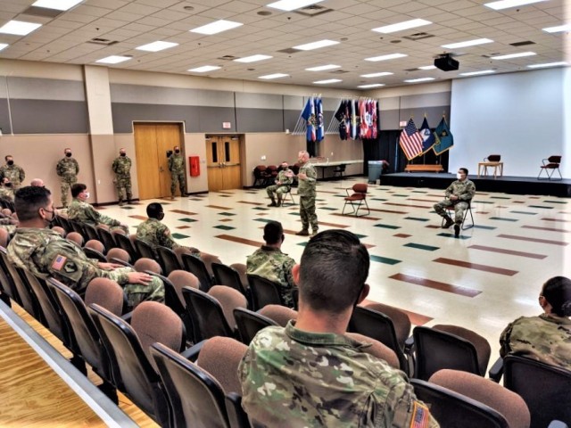 Command Sgt. Maj. Paul Mantha, garrison command sergeant major, talks to students in the Battle Staff Noncommissioned Officer Course on Dec. 22, 2020, at the Noncommissioned Officer Academy at Fort McCoy, Wis. Mantha was joined by Garrison...