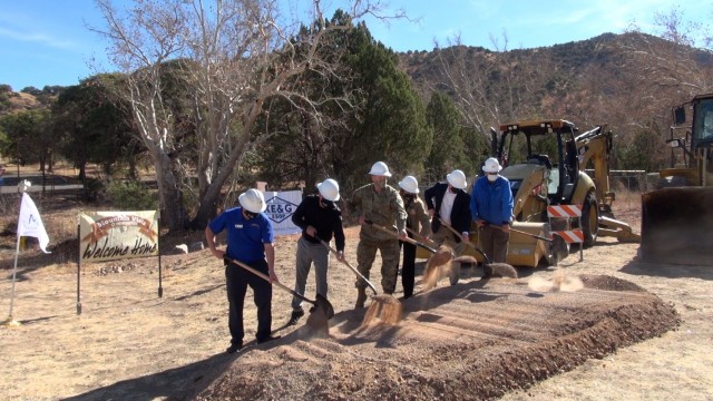 Fort Huachuca, Ariz. leadership and officials from private companies break ground at a ceremony marking the construction of a new bridge into the Bonnie Blink Housing Area.