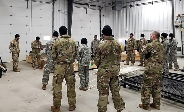 Soldiers with the 1st Battalion, 310th Brigade Engineer Battalion participate in training Dec. 9, 2020, at Fort McCoy, Wis. The training was foundational day training for the unit to focus on multiple subjects including cold-weather operations....