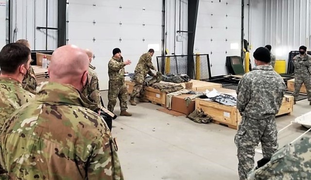Soldiers with the 1st Battalion, 310th Brigade Engineer Battalion participate in training Dec. 9, 2020, at Fort McCoy, Wis. The training was foundational day training for the unit to focus on multiple subjects including cold-weather operations....