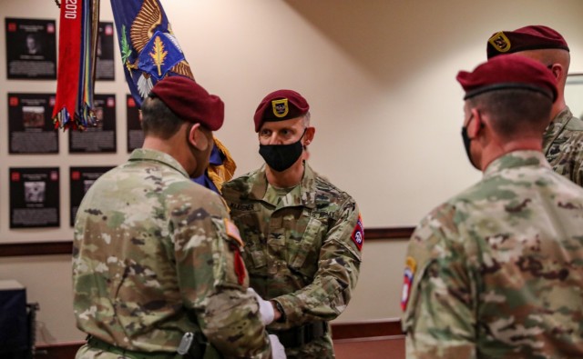 Commanding Officers of the 82nd Airborne Division participate in the ceremonial passing of the unit colors at the Hall of Heroes on Fort Bragg, N.C., Jan. 11, 2021. U.S. Army Col. Theodore Kleisner is the incoming brigade commander of the 1st Brigade Combat Team, 82nd Abn. Div. (U.S. Army photo by Pfc. Vincent Levelev)