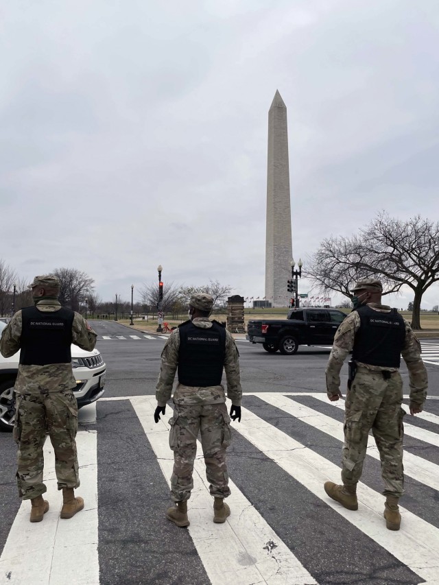 DC National Guard members, stand in front of monument in Washington, D.C on January 5, 2021. The District of Columbia National Guard   activated several hundred personnel to support the city government during expected demonstrations.
