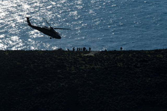 A U.S. Army UH-60M Black Hawk helicopter assigned to 1st Battalion, 101st Combat Aviation Brigade, 101st Airborne Division (Air Assault) takes off from Velopoula Island in the Aegean Sea in Greece, Jan. 14, 2021. The helicopter was taking part in...