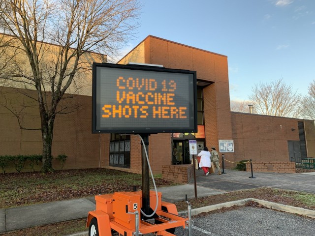 A sign activated Monday in front of Clark Fitness Center announces the availability of COVID-19 vaccinations at Fort Lee. All this week, healthcare providers and medical support personnel, and emergency services and public safety employees will be...