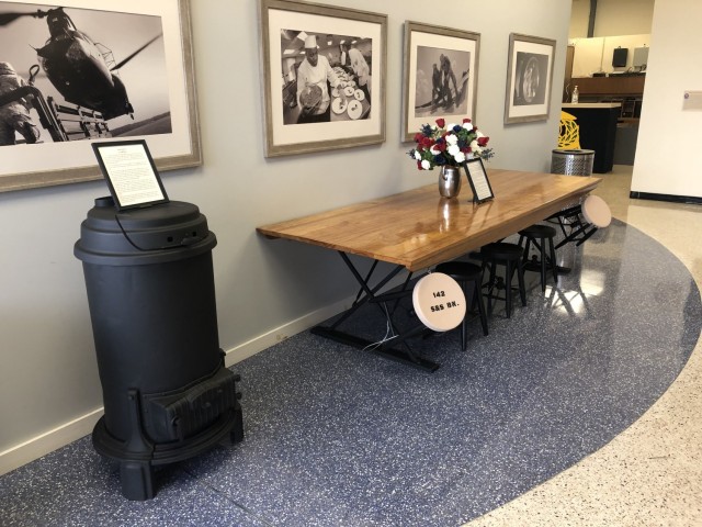 The No. 1 Space Heater sits next to the M-1903 mess hall table with its M-1883 stools in the Quartermaster Museum Jan. 5 on Fort Lee, Va.