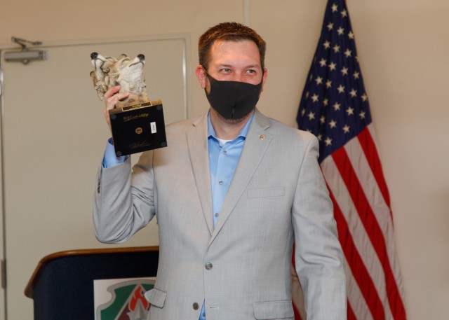 Gary Crispell, a PHC-P microbiologist, accepts the Fiscal Year 2020 Wolf Pack Award on behalf of SARS Team Six during a virtual ceremony Jan. 20, 2020, at Camp Zama, Japan. The Wolf Pack Award recognizes exceptional teamwork by an integrated group...