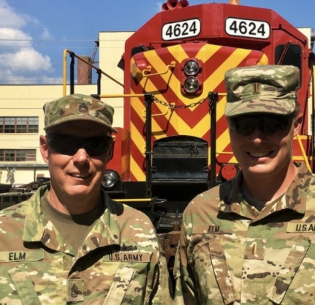 Sgt. 1st Class Jason Elm (left) and U.S. Army 1st Lt. David Elm pose with a U.S. Army locomotive. Both serve in the U.S. Army Reserves 757th Expeditionary Railway Center, headquartered in St. Louis, Mo., as railroaders. Jason currently serves as...