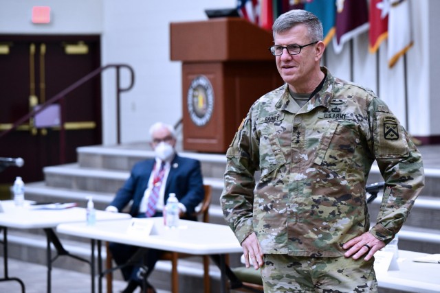 Lt. Gen. James Rainey, Commanding General, U.S. Army Combined Arms Center (CAC) and Fort Leavenworth, Kansas, addresses MEDCoE commanders and leaders while Mr. J. M. (Jay) Harmon III, SES, Deputy to the Commanding General MEDCoE, looks on.