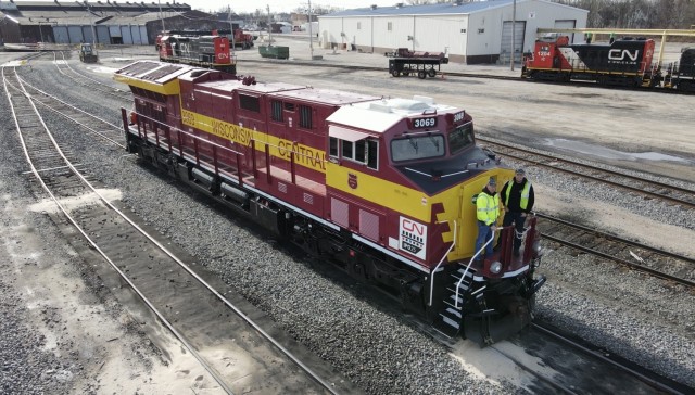 Sgt. 1st Class Jason Elm (left) and U.S. Army 1st Lt. David Elm pose for a photo on a Wisconsin Central Rail Lines locomotive. Both serve in the U.S. Army Reserves 757th Expeditionary Railway Center, headquartered in St. Louis, Mo., as...