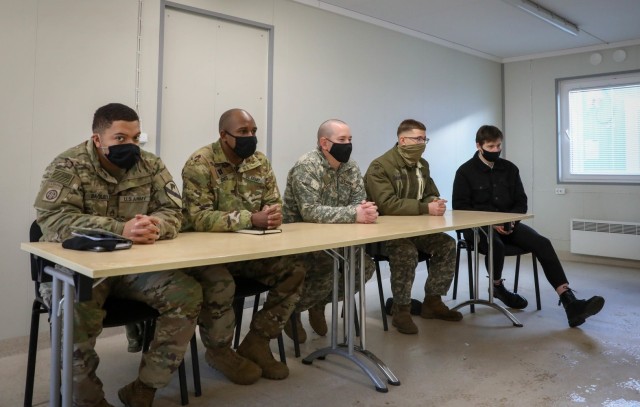 A panel of 2nd Battalion, 8th Cavalry Regiment Troopers and a Lithuanian interpreter digitally meet Lithuanian military cadets from the General Povilas Plechavicius Cadet Lyceum during a video teleconference Jan. 15, 2021. The cadets were able to get an inside look into the lives of U.S. Troopers and the jobs they perform for the U.S. Army. (U.S. Army photo by Sgt. Alexandra Shea)