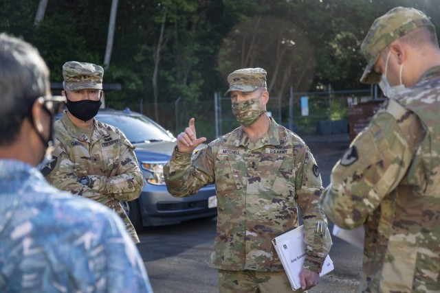 Army Sustainment Command's commanding general, Maj. Gen. Daniel Mitchell, asks questions during a tour of the 402nd's proposed Modernization Displacement and Repair Site, also known as the MDRS.