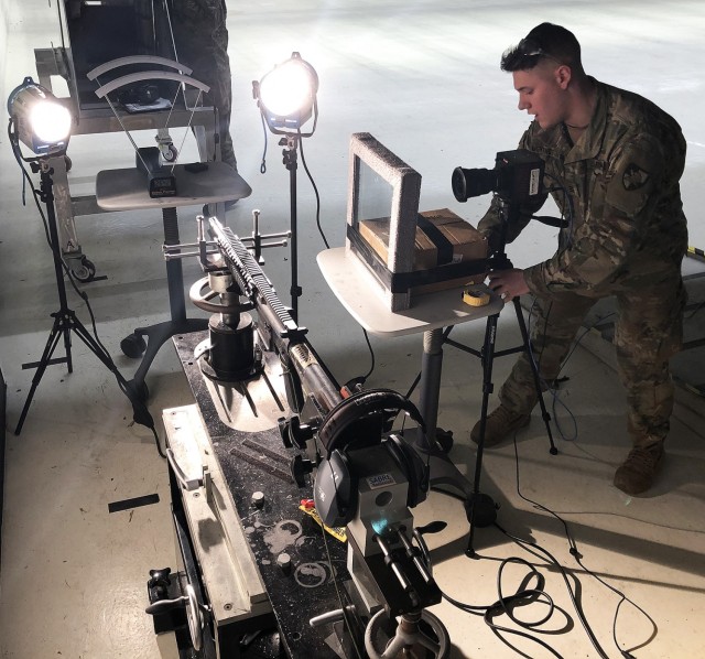 Second Lt. William Morningstar preparing to test an abrasion resistant steel panel.	  (Courtesy Photo)