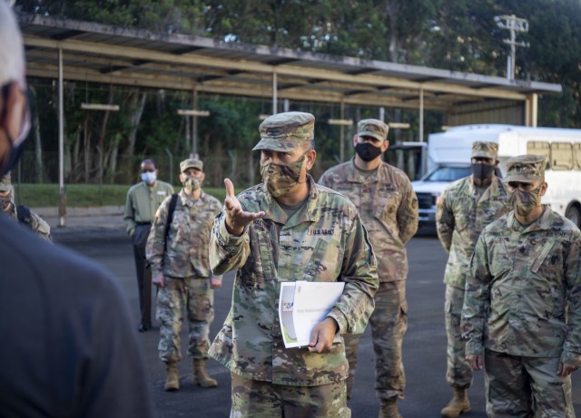 402nd Army Field Support Brigade commander Col. Anthony Walters explains the brigade's plan for a Modernization Displacement and Repair Site, or MDRS, to Army Sustainment Command's commanding general Maj. Gen. Daniel Mitchell. The creation of an...