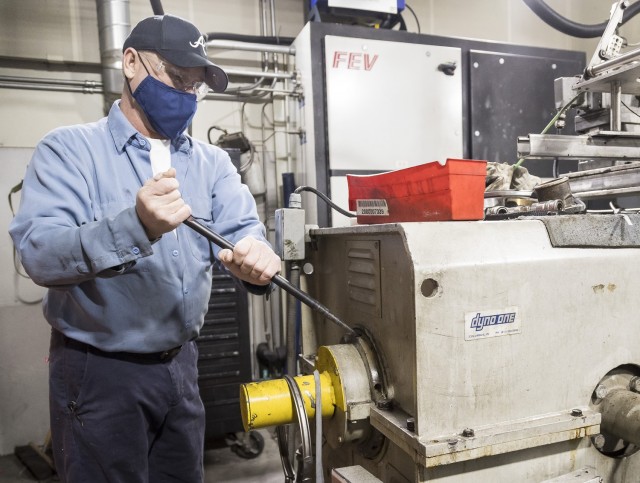 Jeff Bracket, an Anniston Army Depot instrument mechanic, works on the dynamometer.