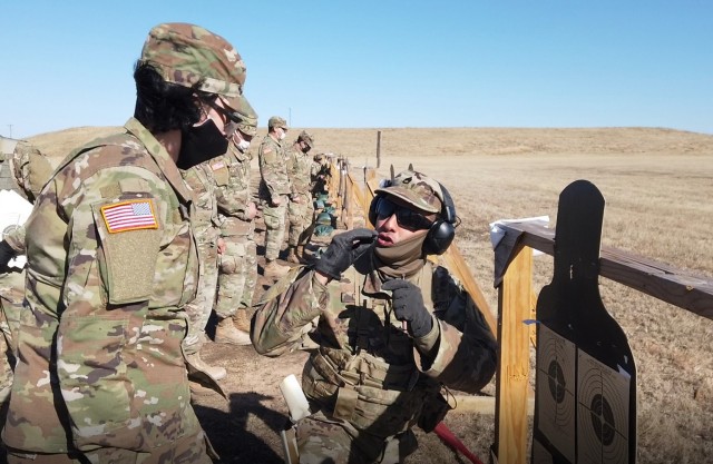 Cadre instruct trainees on how to shoot their weapons to zero and qualify for basic rifle marksmanship Jan. 14, 2021. Trainees are training in their bay formations for a two-week period of time following holiday block leave.