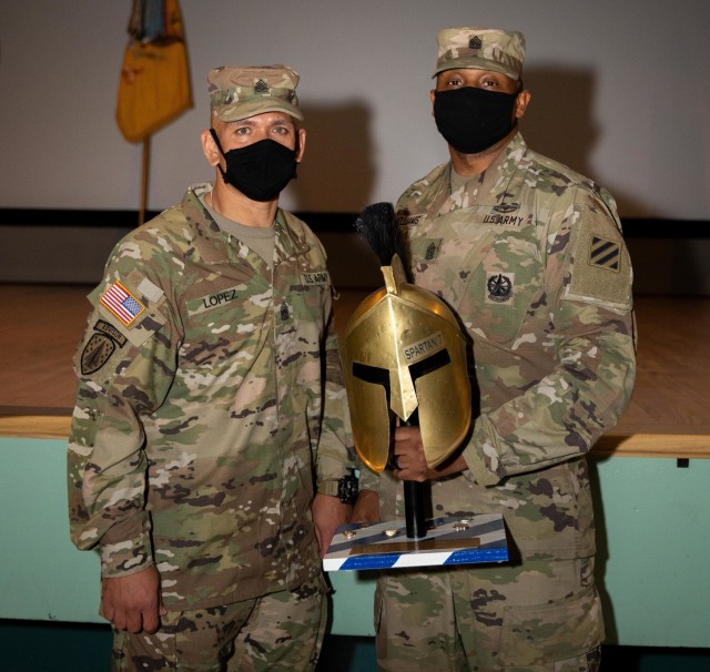 Incoming senior enlisted advisor, Command Sgt. Maj. Jaime Lopez of the 2nd Armored Brigade Combat
Team, 3rd Infantry Division, takes a picture with outgoing Command Sgt. Maj. Jabari O. Williams after a
change of responsibility ceremony, Jan. 22, 2021, at Woodruff Theater on Fort Stewart, Georgia. The
ceremony marks the official transition of authority as Command Sgt. Maj. Lopez assumes responsibility
for the brigade.
(U.S. Army photo by Spc. Devron Bost)