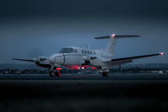 A U.S. Army C-12 of the 12th Combat Aviation Brigade, Wings of Victory, spins up at Wiesbaden Army Airfield for an early morning flight in support of the NATO Kosovo Force peacekeeping mission on Jan. 14. (U.S. Army photo by Maj. Robert Fellingham)