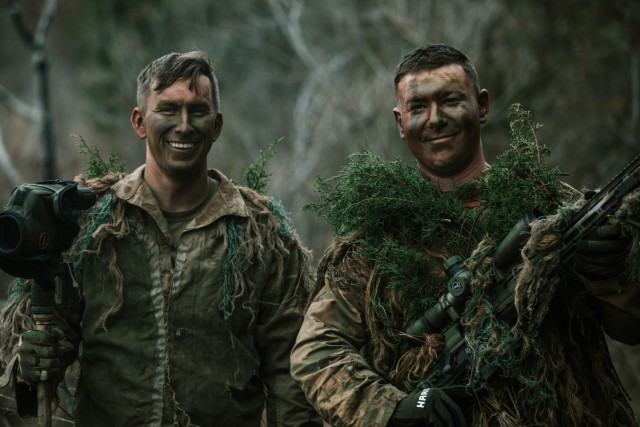 Spc. Jarrod Thomas and Cpl. Dalton Palmer, both Snipers with 1st Battalion, 12th Cavalry Regiment, 3rd Armored Brigade Combat Team, 1st Cavalry Division, pose for a photo as a two-man team after completing a successful mission during a movement,...