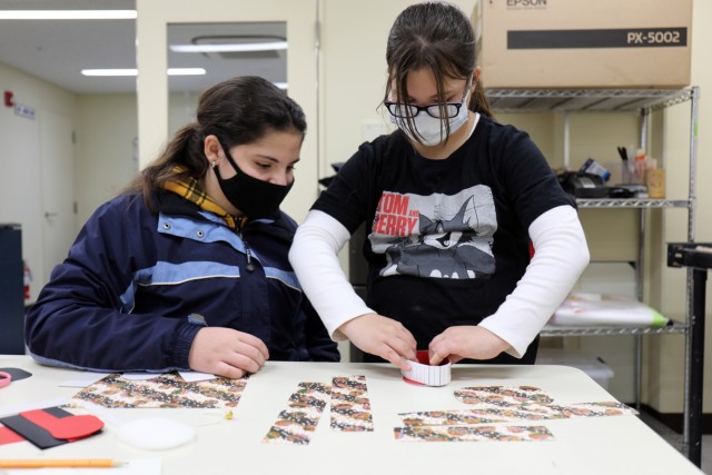 Camryn, right, and Emmi Rosa, both 11, make a washi paper box at Camp Zama, Japan, Jan. 23.