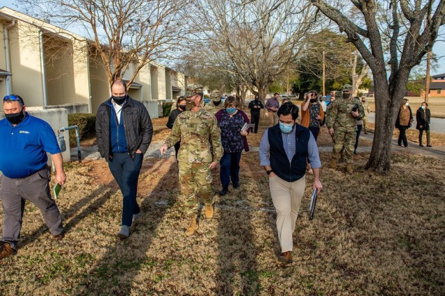 FORT BENNING, Ga. – Maj. Gen. Patrick J. Donahoe, commanding general of the U.S. Army Maneuver Center of Excellence and Fort Benning, accompanied by other key officials, makes a &#34;walking town hall&#34; visit for a first-hand look at conditions at the Norton Court residential area here Jan. 20. The walk-through was part of Donahoe&#39;s new initiative to improve oversight of Fort Benning&#39;s residential housing by giving himself and other officials a chance to talk face-to-face with residents and gain eyes-on awareness of housing conditions. As a result of the visit, officials intend to schedule Norton Court for power-washing of the buildings and other improvements. Plans call for Donahoe and others to visit residential housing areas at a rate of one a month.

(U.S. Army photo by Patrick A. Albright, Maneuver Center of Excellence and Fort Benning Public Affairs)