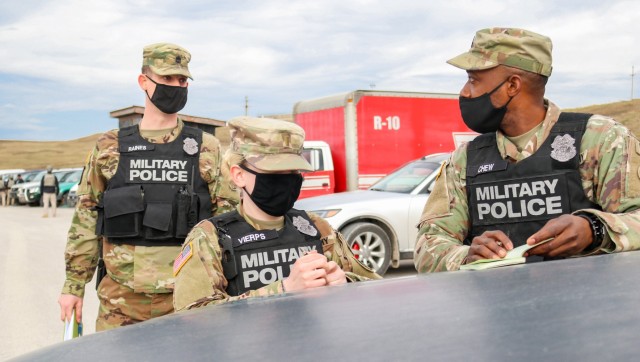 Sgt. 1st Class Michael Raines, provost sergeant for Regional Command-East, Kosovo Force 28, checks on his response team during a joint force protection exercise at Camp Bondsteel, Kosovo, on Jan. 23, 2021. A mock vehicle-born improvised explosive...