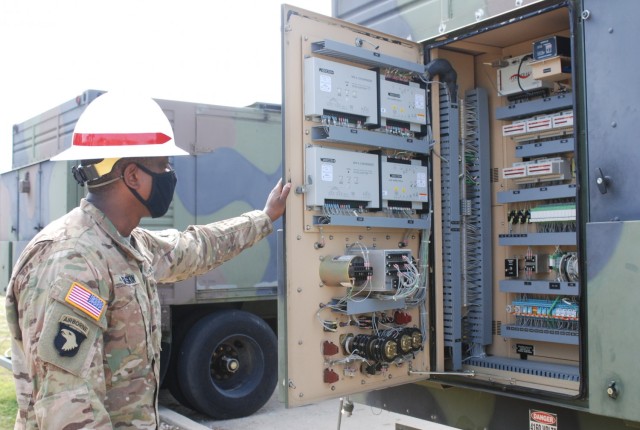 Staff Sgt. Russell Gaskin, U.S. Army Prime Power School instructor, reviews an electrical panel during the Prime Power Capstone Training Exercise at the Contingency Basing Integration Training and Evaluation Center (CBITEC) in Fort Leonard Wood,...