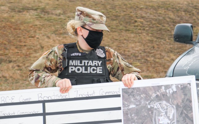 2nd Lt. Allison Vierps, the military police officer in charge of Regional Command-East, Kosovo Force 28, sets up a staging area during a joint force protection exercise at Camp Bondsteel, Kosovo, on Jan. 23, 2021. A mock vehicle-borne improvised...