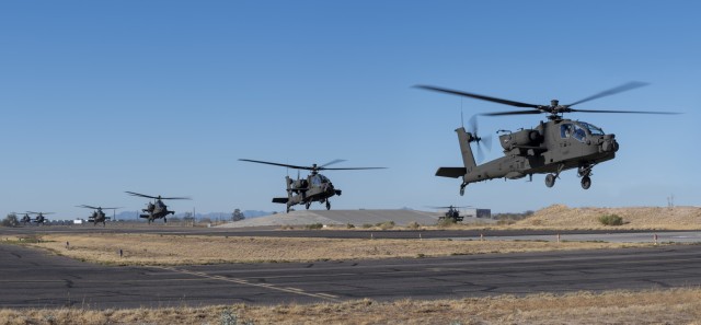 A group of AH-64E version 6 Apache helicopters depart the Boeing manufacturing facilities at Mesa, Ariz. 13 January bound for Joint Base Lewis-McChord (JBLM), Wash. The aircraft will be delivered to the  
1-229th Attack Reconnaissance Battalion. With the fielding of these aircraft, the 1-229th ARB, becomes first operational unit to add the Apache V6 aircraft to its inventory.  (Photo Courtesy Boeing Mesa)