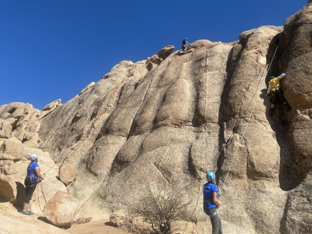 Participants climb a rock face at Crested Butte, Colorado. (Photo via Adaptive Sports Center staff)